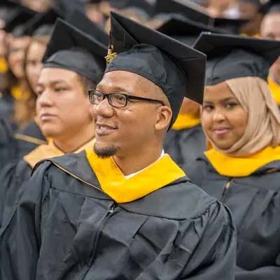 v.c.u. graduates dressed in regalia attending commencement